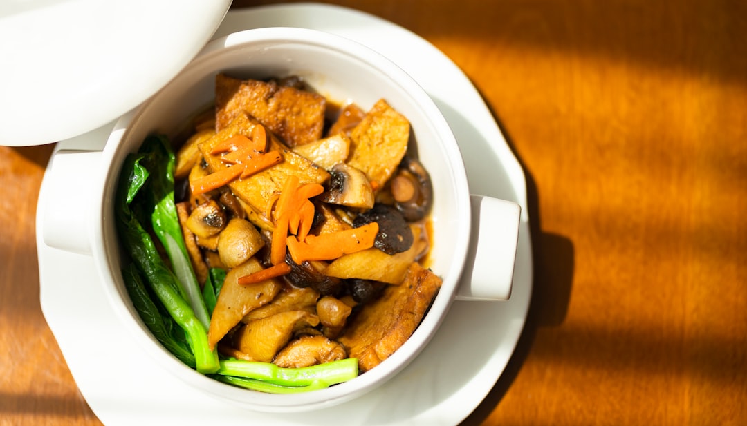GingerInfused Onion Dashi Broth with Crunchy Peanut Croutons Recipe Served