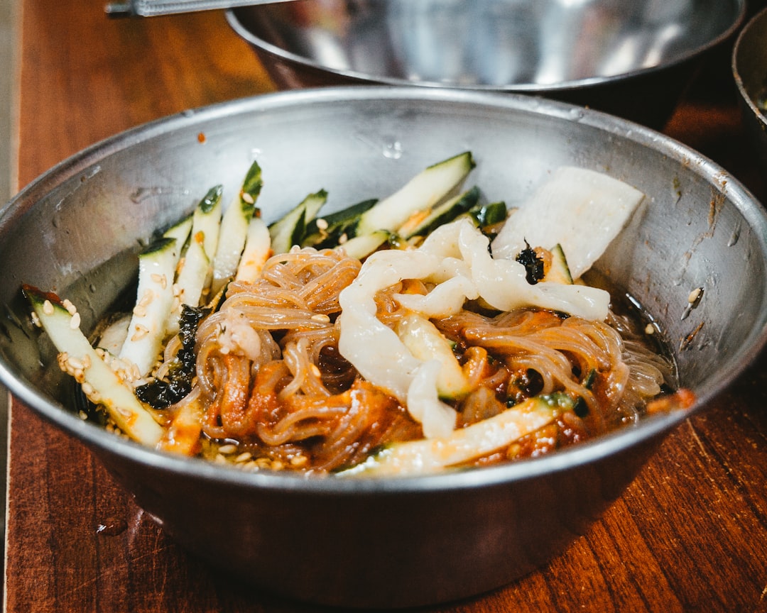 Spicy KoreanStyle Rice Rolls with Parsley and Savory Sauce