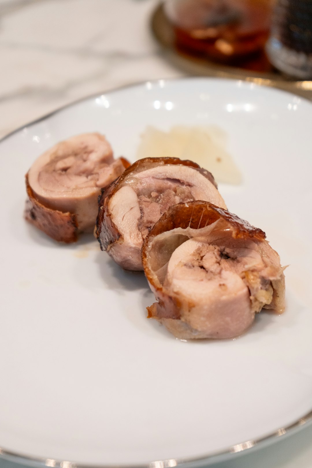 Rich Flavors Unite Savory Pork Belly Foie Gras Medallion Delight