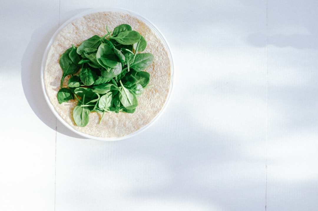 Delicious Spinach and Peach Burrito with Creamy Yogurt Sauce